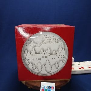 Santa Flying Over The Village